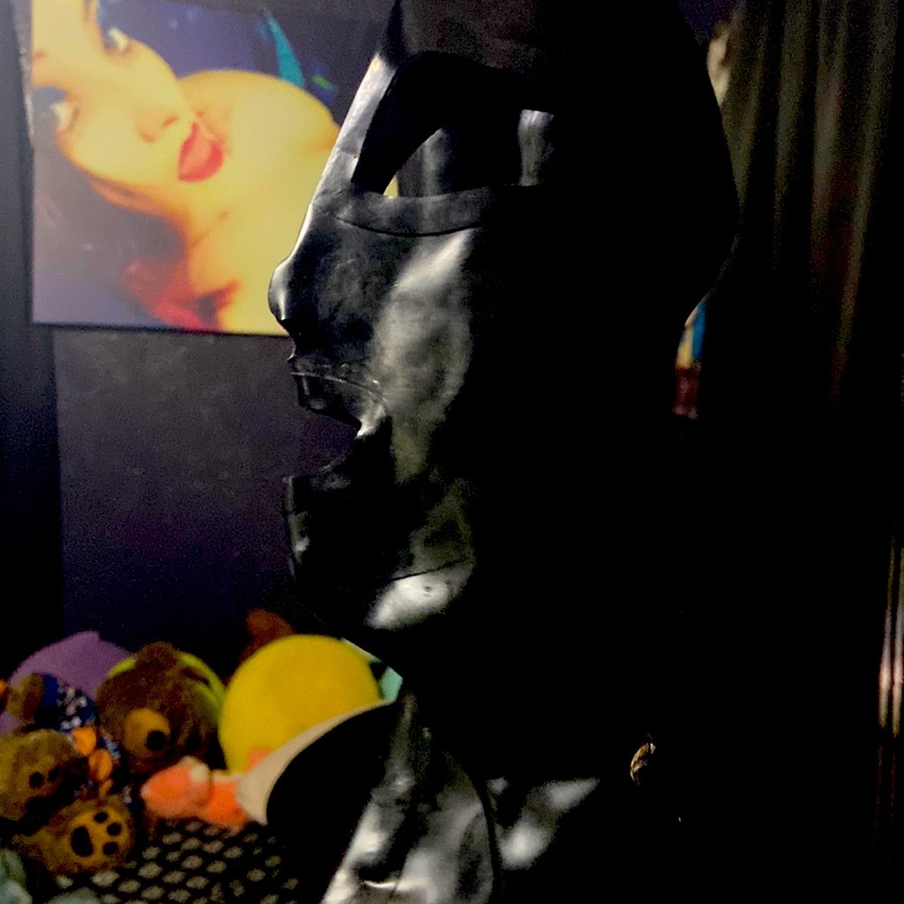 Latex rubber hood.